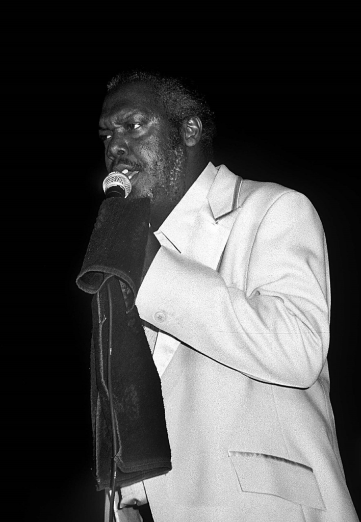 Dennis “Sprangalang” Hall, master of ceremonies of the Calypso Revue, hosts Dimanche Gras in 1993. PHOTO BY MARK LYNDERSAY - 