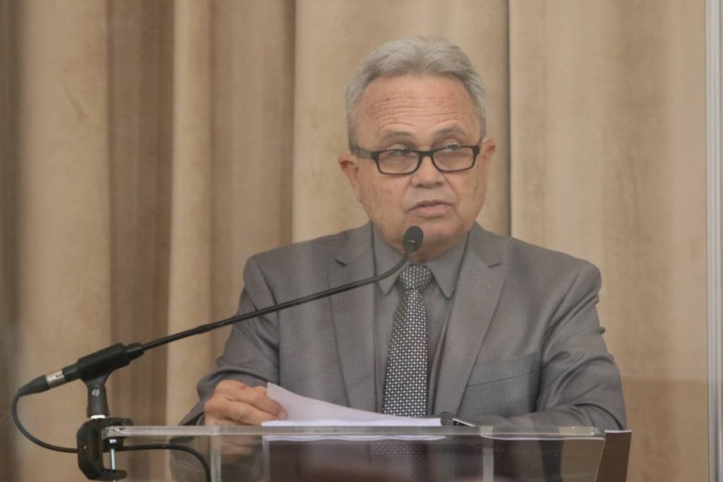 Finance Minister Colm Imbert reads the budget in Parliament on Monday.  - Office of Parliament