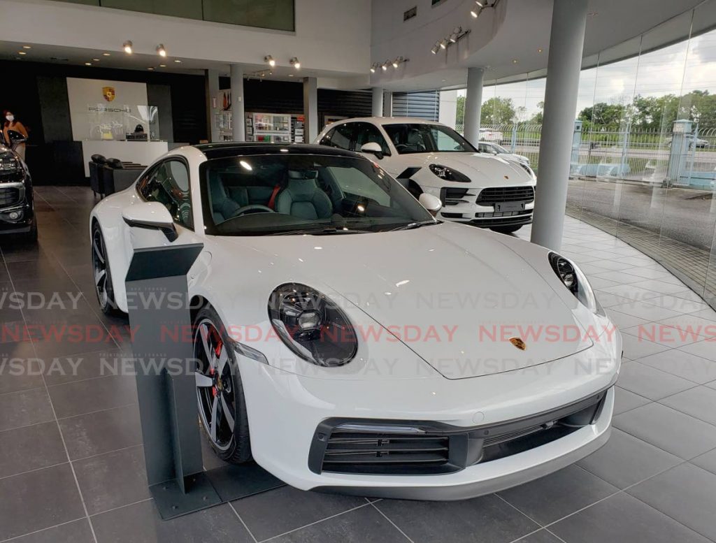 The Porsche 911 Turbo S, one of the world’s 
celebrated 
premium luxury brands in the Porsche showroom at Lifestyle Motors, costs about 
$2.2 million. - ROGER JACOB