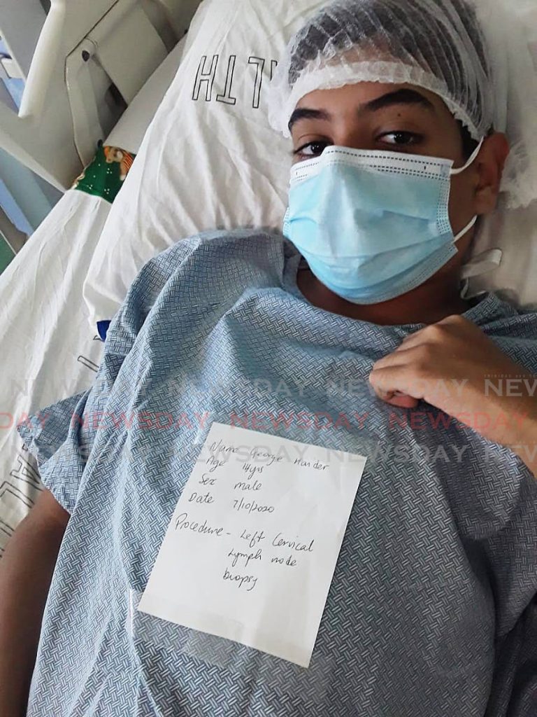 A note on George Riad Haidar Maican’s chest states his name, age, date at the time (October 7) and request for a biopsy. The 14-year-old Venezuelan is warded at San Fernando General Hospital but is not eligible for chemotherapy to treat his cancer. PHOTO BY LINCOLN HOLDER - 