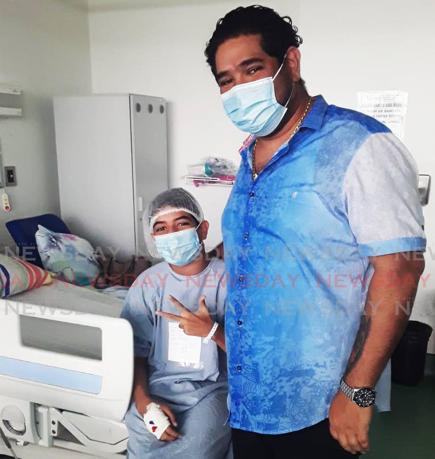  Rida George Haidar and his son George Riad Haidar Maican  who has been hospitalised at the San Fernando general Hospital after being diagnosed with classical  Hodgkin Limphoma nodular sclerosis sudtype. - Lincoln Holder