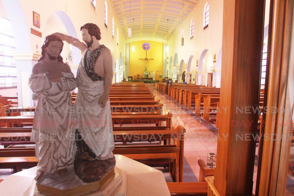 Our Lady of Perpetual Help RC Church, Harris Promenade, San Fernando was open for anyone who wanted to pray on Friday. The Prime Minister on Saturday announced places of worship may have hour-long services at 50 per cent capacity. PHOTO BY LINCOLN HOLDER - 