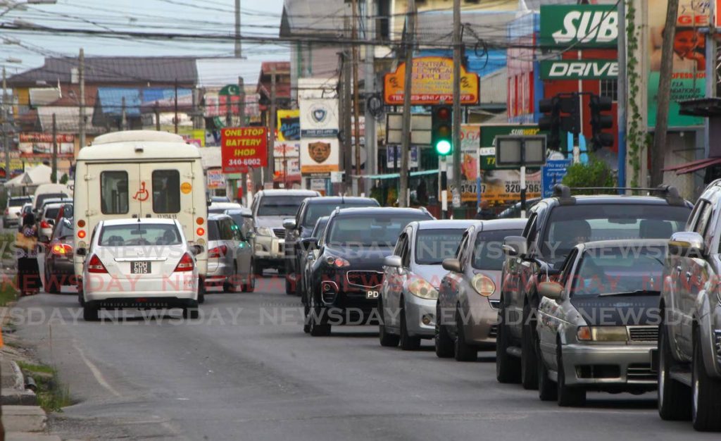 CLOGGED: Midday traffic on the main road in Chaguanas on Thursday. PHOTO BY ROGER JACOB - 