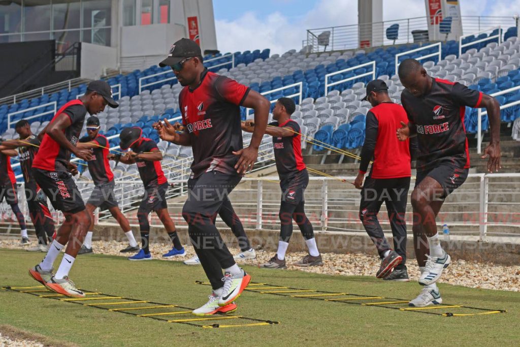 In this March 11 file photo, Darren Bravo (C) and other members of the TT Red Force squad take part in a training session at the Brian Lara Cricket Academy, Tarouba. - Marvin Hamilton