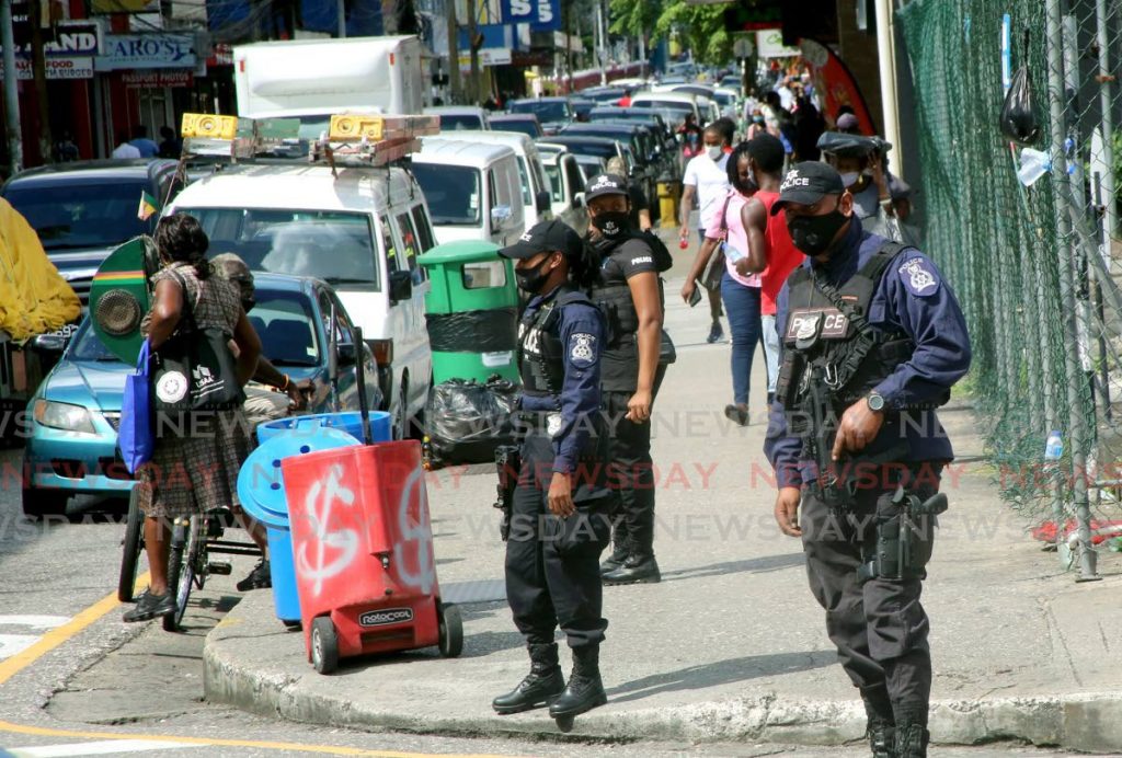 FILE PHOTO: Police on patrol on Frederick Street in Port of Spain. - SUREASH CHOLAI