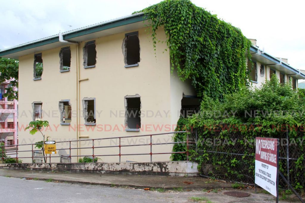 The failed Las Alturas Tower that was uninhabitable because of damaged caused by a land stabilization problem, the build was condemned and earmarked to be demolished,
The Las Alturas Housing Project built by the Housing Development Corporation, nestled in the hills of Morvant, 
Las Alturas Housing Development, Morvant. - ROGER JACOB