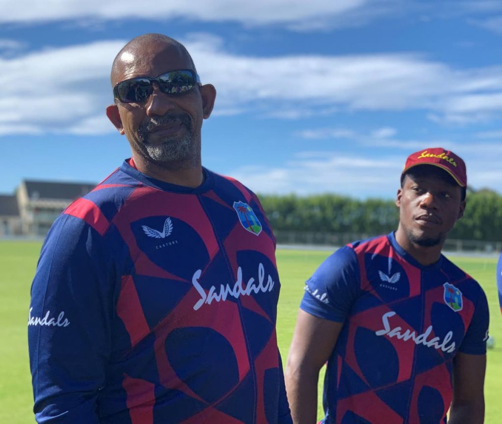 West Indies head coach Phil Simmons, left, and Nkrumah Bonner, right, during a training session in New Zealand. - CWI Media
