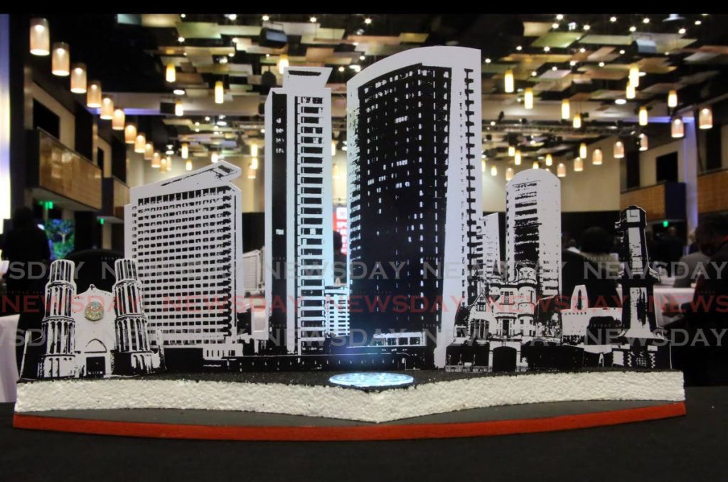 A display highlighting recognisable buildings in Port of Spain was used on each table at the Ministry of Planning and Development’s Spotlight on Urban Development at the Hyatt Regency in Port of Spain on Monday. - SUREASH CHOLAI