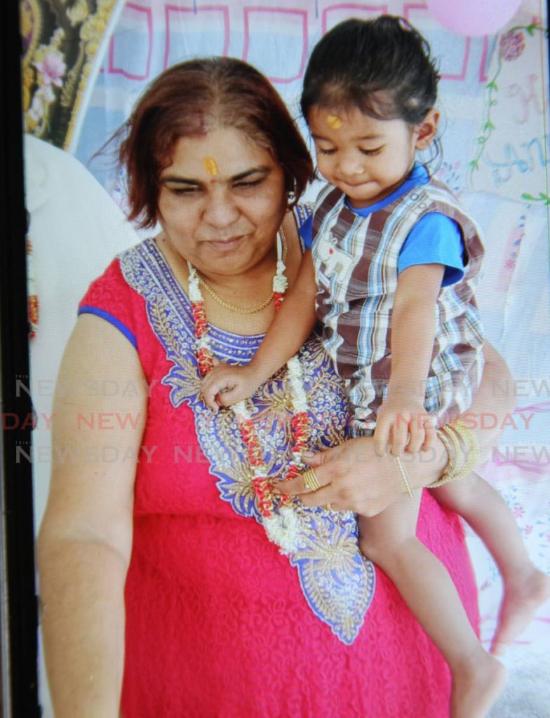 Veer Latchman, 2,  and grandmother Sunti Sookoo. Latchman is warded at the San Fernando General Hospital with an object believed to a bullet lodged in his right arm. - Lincoln Holder