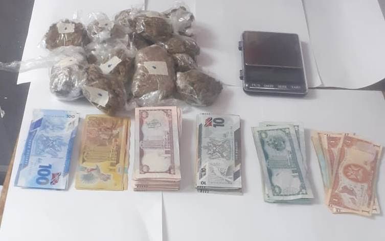 Police seized $4,069 in cash and a quantity of marijuana at a house in Picton Street, Port of Spain on Thursday. 
A 39-year-old man who was at the house at the time was arrested. 

PHOTO COURTESY TTPS - TTPS