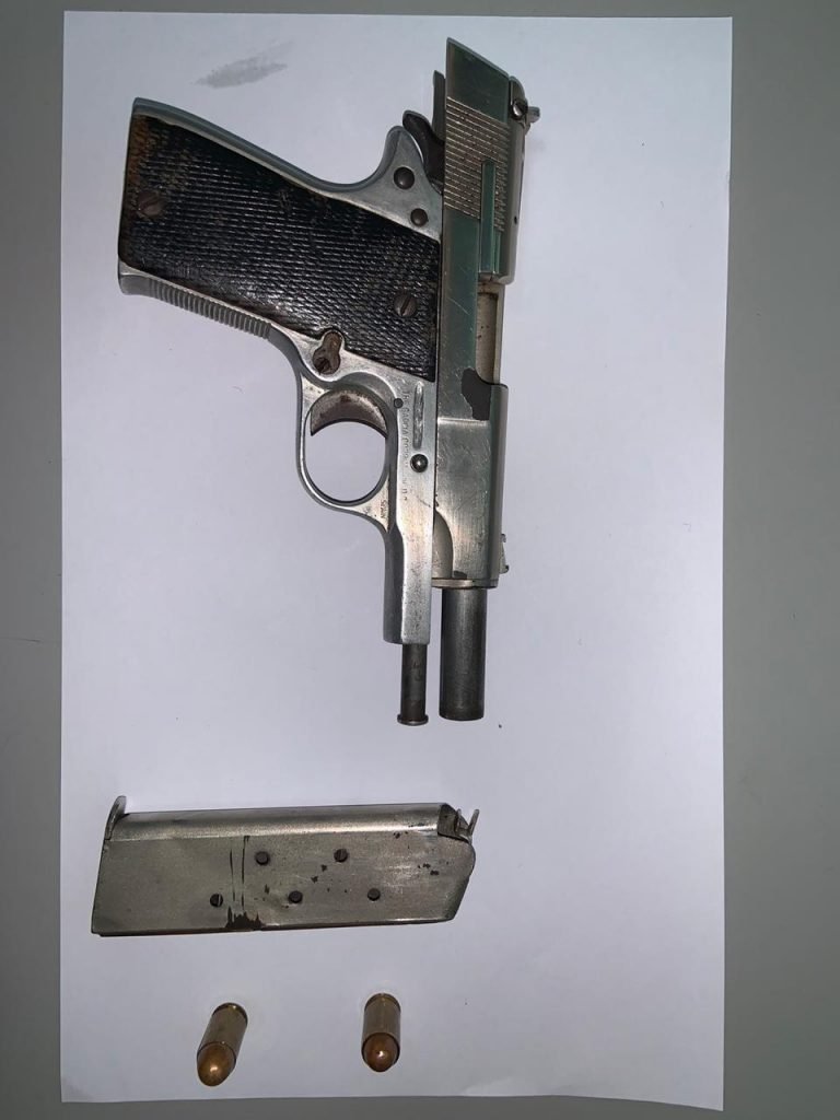A pistol and two rounds of ammunition seized from a man in Spring Valley Road, Mt D'Or, on Sunday morning. 
The 34-year-old Champs Fleurs man found with the gun was arrested. 

PHOTO COURTESY TTPS 