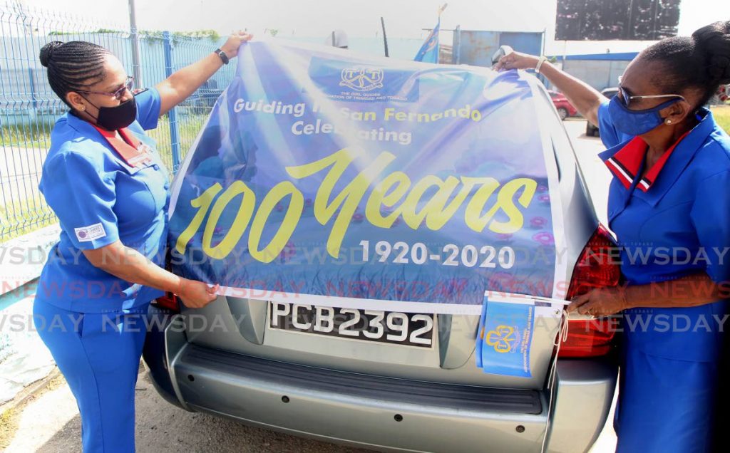 The Girl Guides Association of Trinidad and Tobago celebrated 100 years  in San Fernando with a motorcade. - Photos by Lincoln Holder