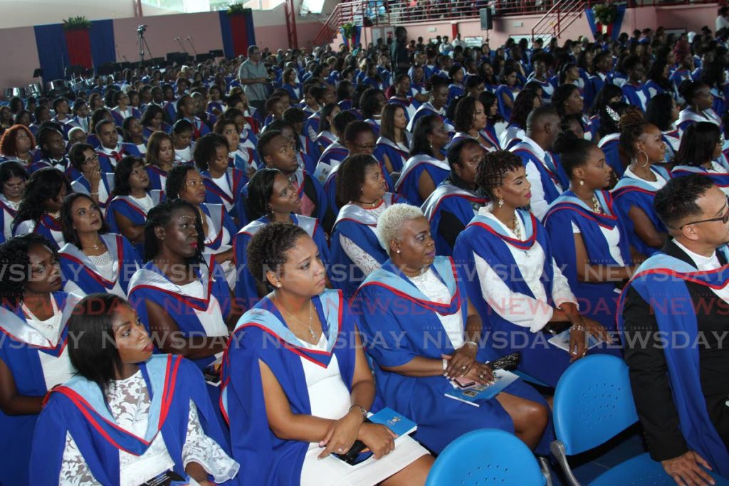 A cross-section of graduates during UWI St Augustine's graduation ceremony on August 28, 2017. The university will review its policies following Government's cuts to the GATE funding programme. File photo
 - 