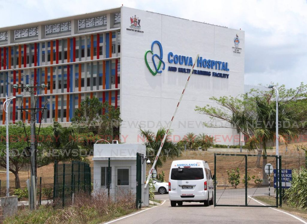 In this April 29, 2020 file photo, an ambulance enters the Couva Hospital and Multi-purpose Training Facility in Couva, one of the hospitals used for covid19 patients. - 