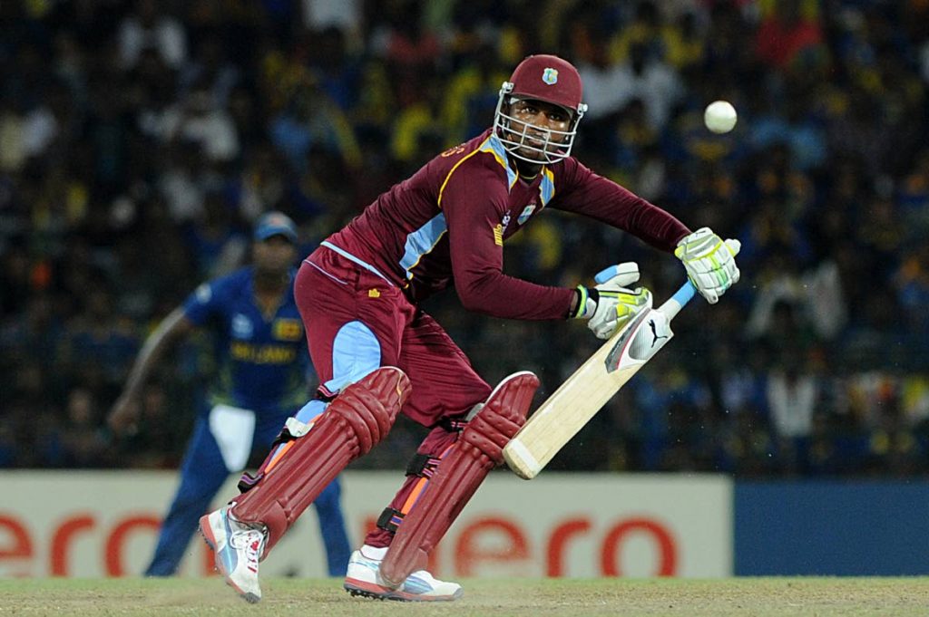 West Indies cricketer Marlon Samuels plays a shot during the 2012 T20 World Cup final against Sri Lanka at the R Premadasa International Cricket Stadium in Colombo. (AFP PHOTO) - 