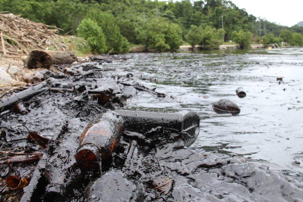 In this 2017 file photo, the effects of an oil spill can be seen along the shore in Chaguaramas. TT’s climate manoeuvrability is awkward because the economy is based on fossil fuels but as a small island developing state (SIDS) the country is uniquely susceptible to the ravages of climate change. - FILE PHOTO: ANGELO MARCELLE