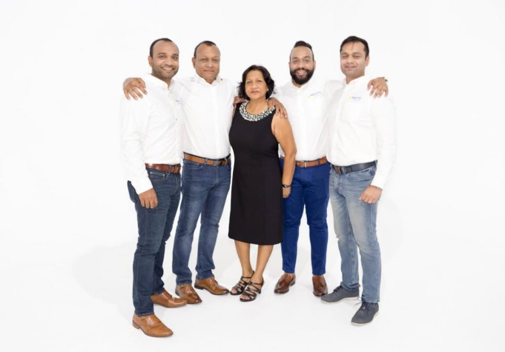 The Ramps Logistics team and Rampersad family. From left are Robbie, Ramnarine, Betty, Rudy, and Shaun Rampersad. - Courtesy Ramps Logistics 