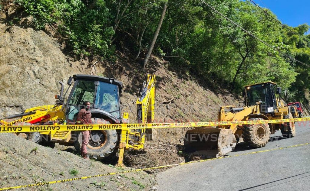 Backhoes on a clean-up operation in Tobago. DIQE - 