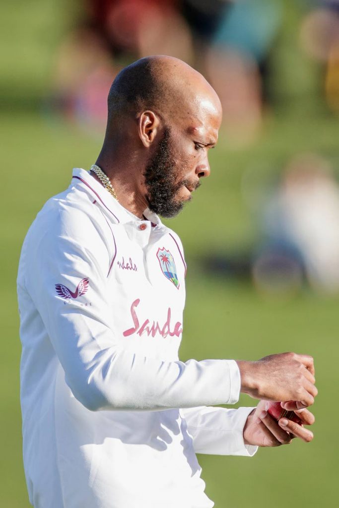 West Indies’ Roston Chase prepares to bowl during the first day of the first Test cricket match between New Zealand and West Indies at Seddon Park in Hamilton on Thursday. AFP PHOTO - 