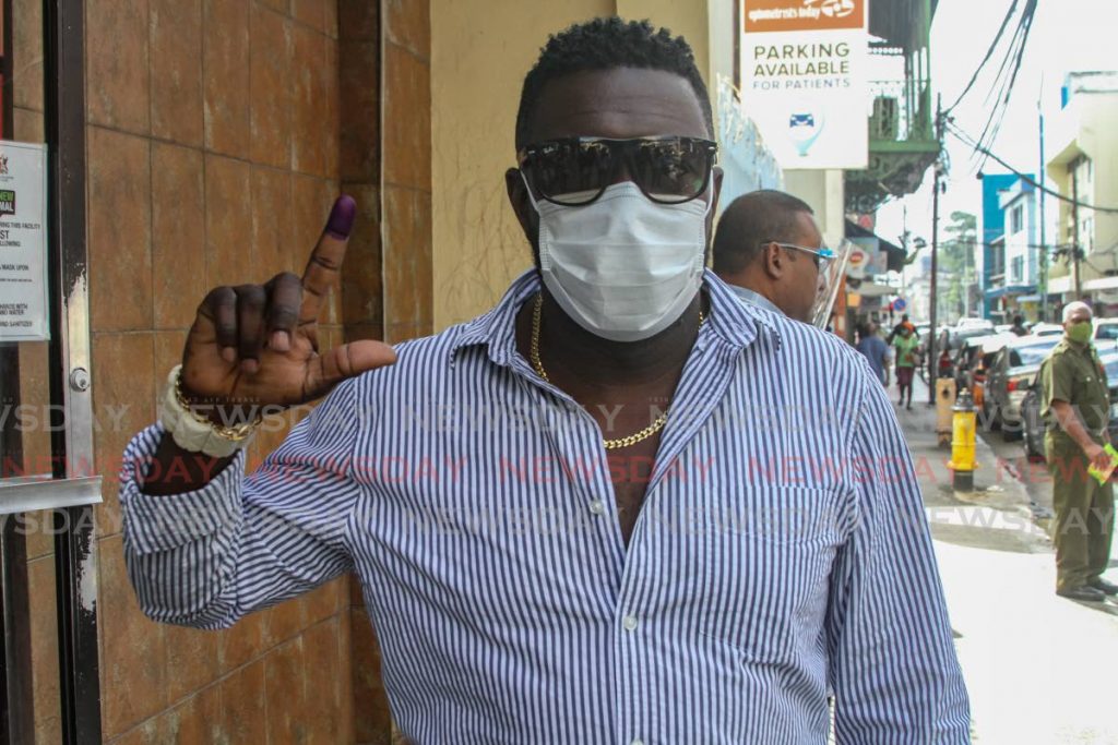 Public Services Association  (PSA) President Watson Duke shows his voting fingers outside the Frederick Street polling station on Monday. - Jeff Mayers