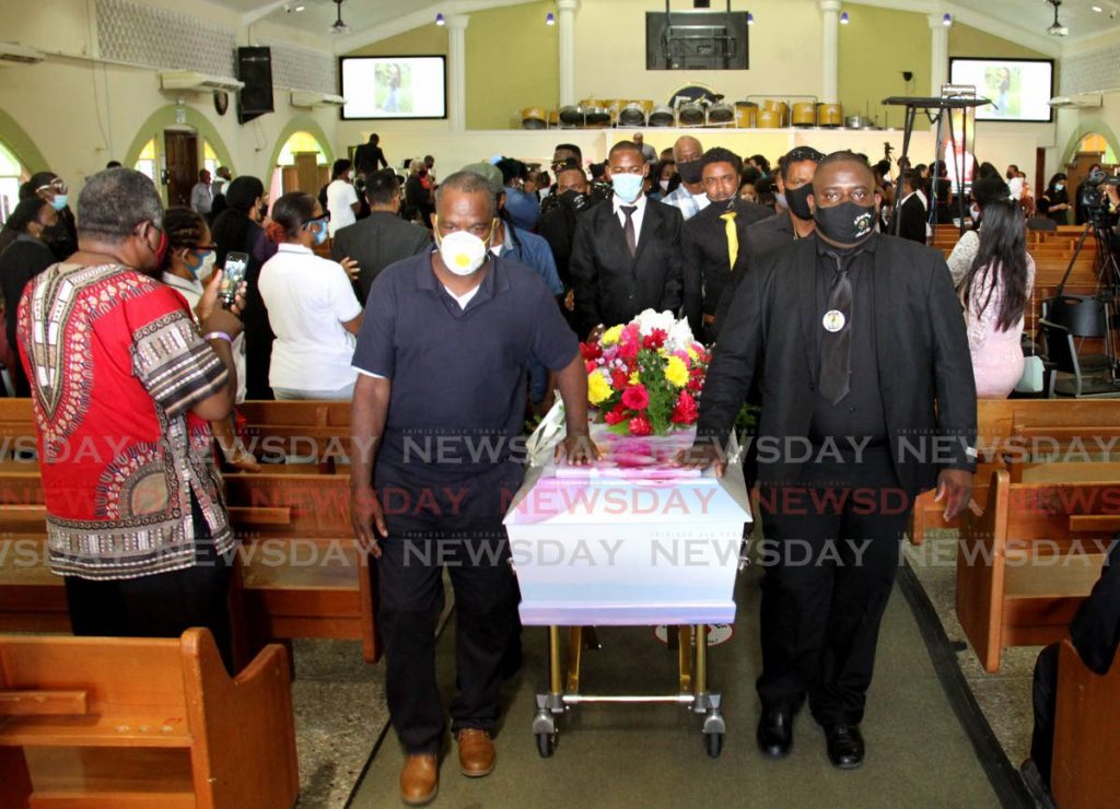 Pallbearers carry the body of Ashanti Riley at her funeral on Monday at the Mt. D'or SDA Church. - AYANNA KINSALE