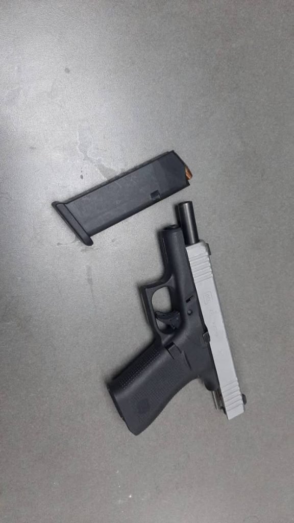 A pistol and magazine containing ammunition believed to be the murder weapon in the death of Neil Johnson early on Tuesday morning. 
Police said the gun was seized from a man who tried to throw it away after shooting Johnson on the Brian Lara Promenade. 

PHOTO COURTESY TTPS - TTPS