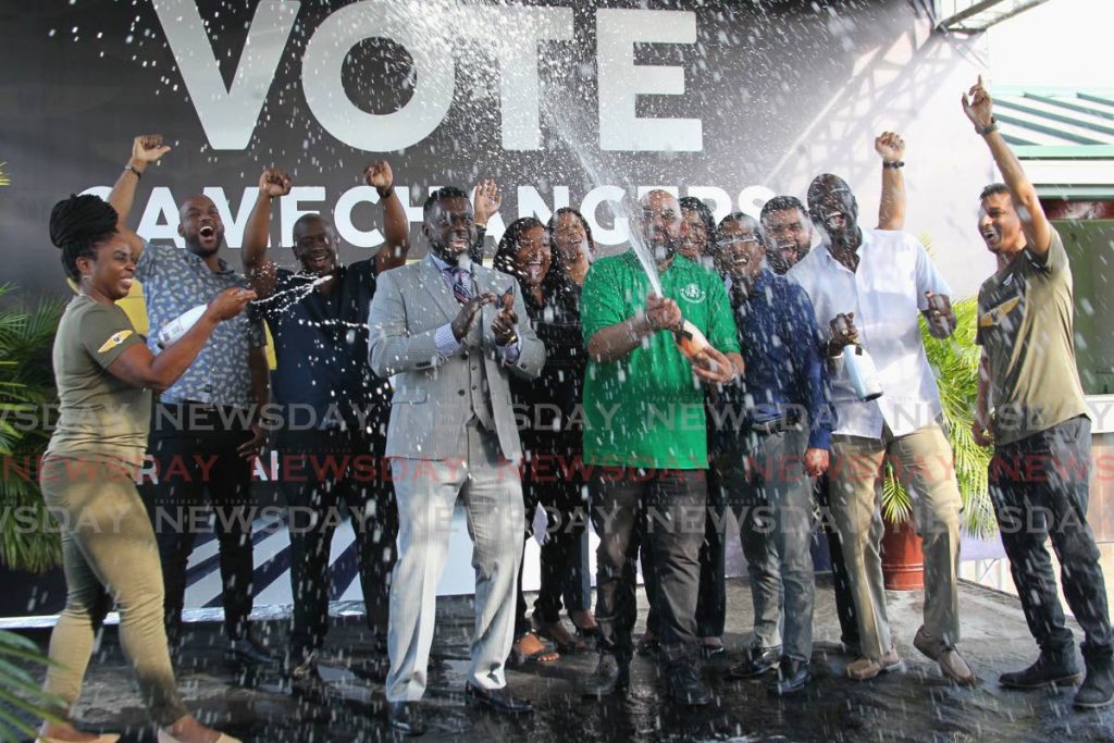 Watson Duke, president-elect of the Public Service Association, celebrates with members of his new executive, after official results were confirmed on Thursday. - ROGER JACOB