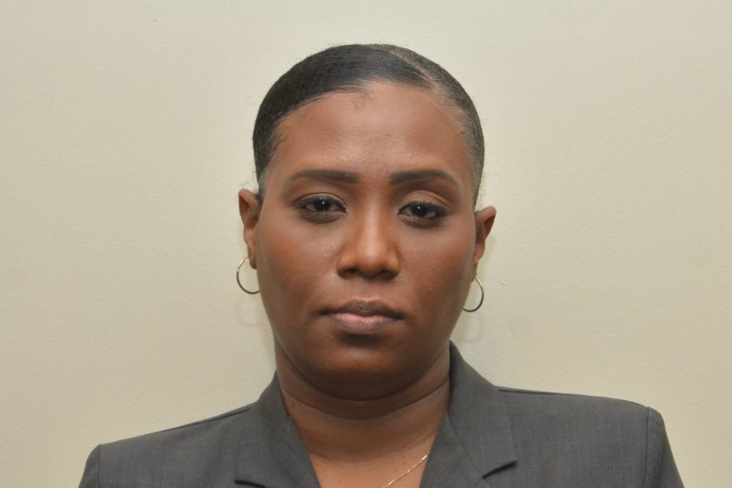 WPC Patrice Clarke was charged with assault by beating a male relative and unlawful assault against a female relative during an incident on September 3. 

PHOTO COURTESY TTPS - TTPS