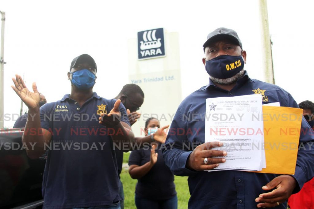 OWTU member, Ernesto Kaser, addressing the media outside YARA Trinidad and Tobago, southern main road, Savonetta.  - Lincoln Holder