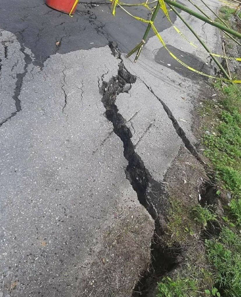  Photo showing the deteriorating road conditions at Robert Village in Tableland. Photo courtesy the Public Transport Service Commission (PTSC) Instagram page.- 