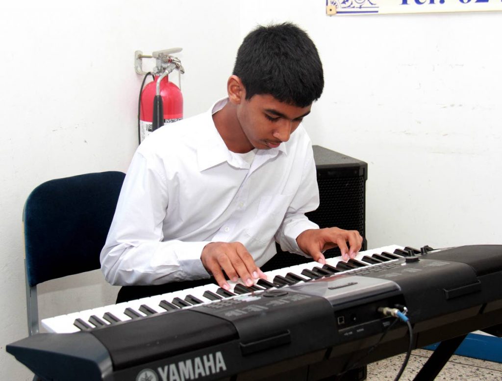 Visually Impaired student of ASJA Boys College, San Fernando provided some entertainment during a presentation of tokens, which took place at the Trinidad and Tobago Blind Welfare Association, Coffee Street, San Fernando. 11.07.2018 - 