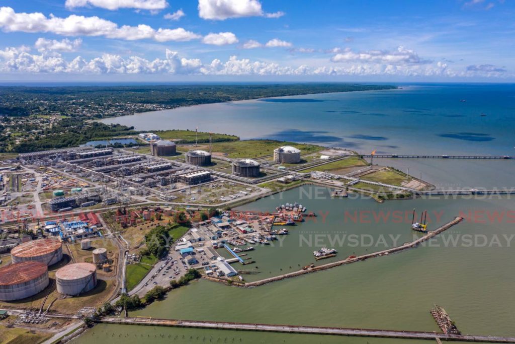 File photo: An aerial view overlooking Heritage Petroleum storage tanks (left) and Atlantic LNG in Point Fortin. - Photo by Jeff K. Mayers