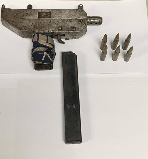 The gun an ammunition found by the police on Saturday. PHOTO COURTESY THE TTPS - 