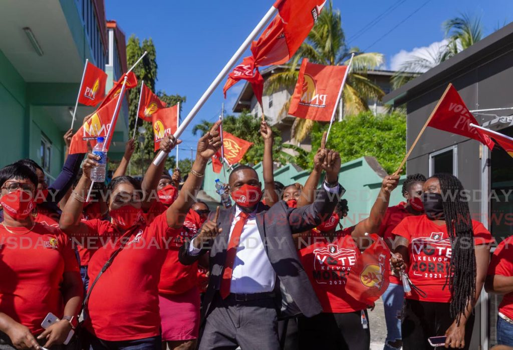 Kelvon Morris, centre, flanked by supporters after he filed his nomination papers on Monday as the PNM's candidate for Black Rock/Whim/Spring Garden in the THA election. PHOTO BY DAVID REID - 