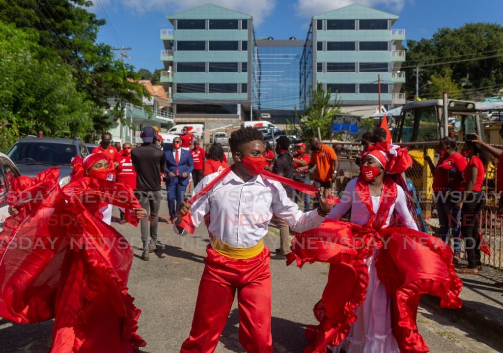 Zante dancers of Tobago accompanied Kwesi Des Vignes on his entrance to file his nomination papers at Glen Road Tobago. - David Reid