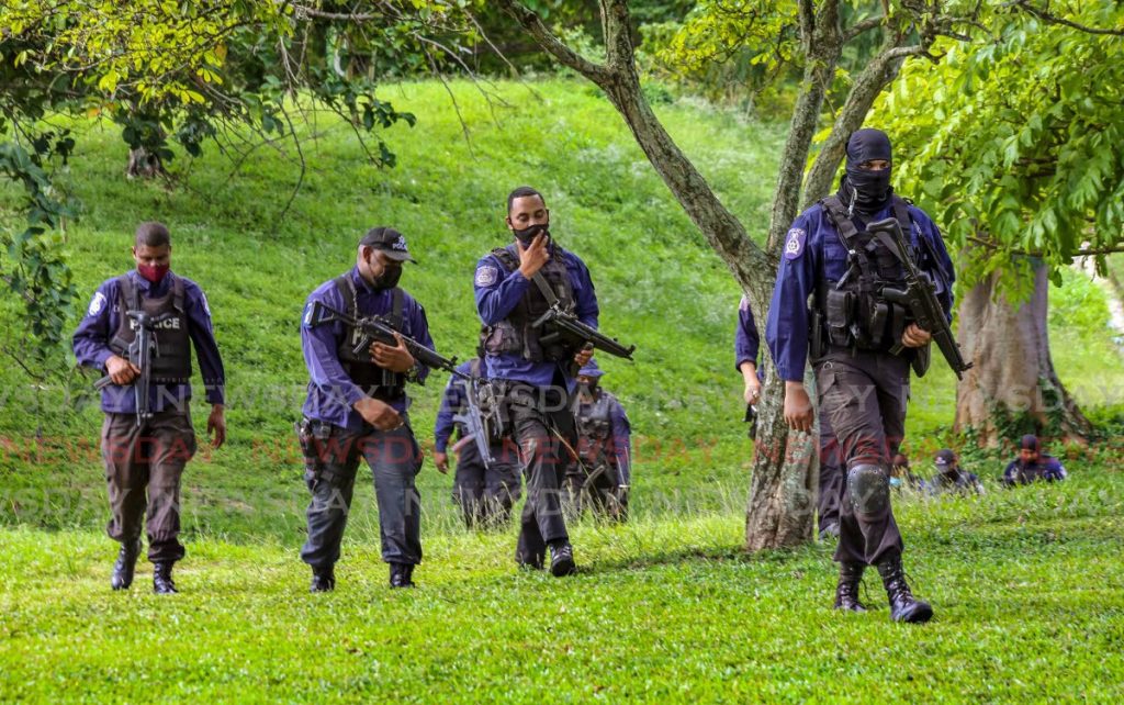 File photo: Police on duty at the Hollows, Queens Park Savannah.