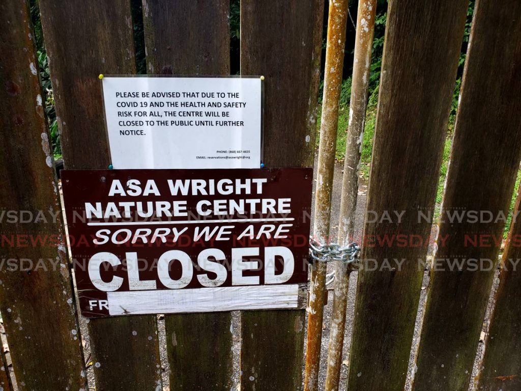 The sign on the gate at the Asa Wright Nature Centre advises potential visitors of its closure. - ROGER JACOB