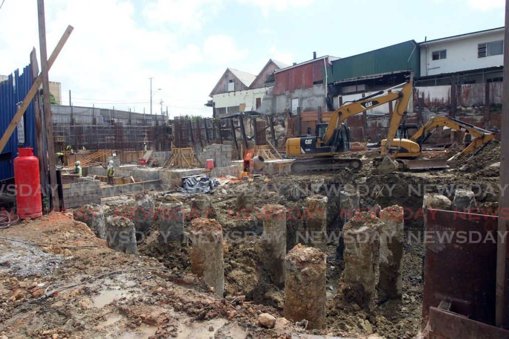 Construction continues on the magistrates' court at Irving and Keate streets, San Fernando on January 19. Contractors are calling for changes to fixed price contracts in the wake of increases in global steel prices. PHOTO BY LINCOLN HOLDER - 