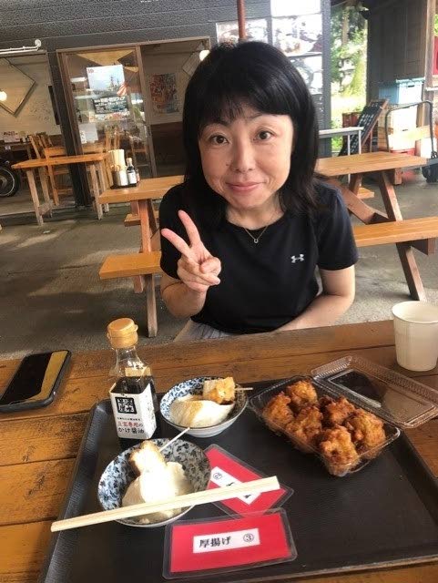 Takeshita-san about to enjoy her tofu dishes.  - 