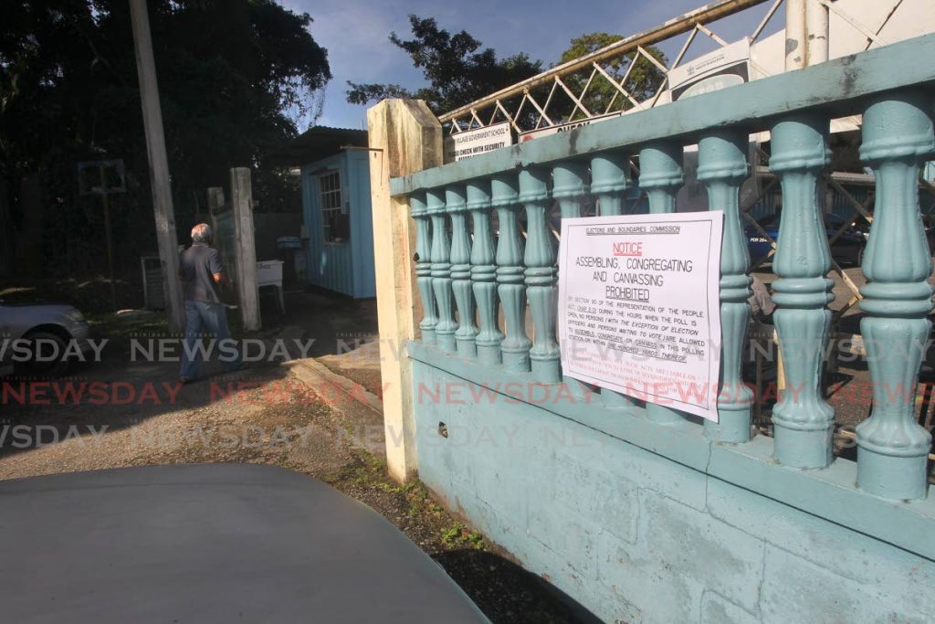 A potential voter enters the Fanny Village government primary school to cast a vote in the local government by-election for the Hollywood district Point Fortin. - Lincoln Holder