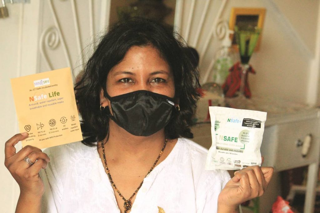 Dr Natasha Mohammed, co-owner of Caribbean Breathalyzer, shows the antimicrobial and reusable face masks the company distributes. Photo courtesy Caribbean Breathalyzer - 