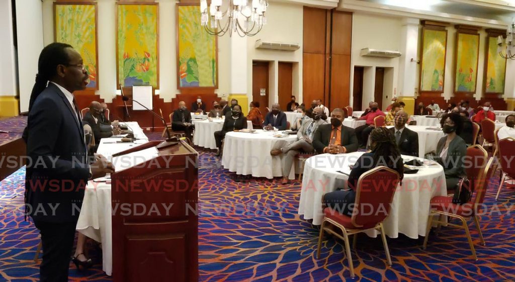 Minister of Youth Development and National Service Fitzgerald Hinds speaks at the launch of the TT Co-operative Credit Union League's launch of its calendar of events at Radisson Hotel, Port of Spain on Wednesday. - ROGER JACOB