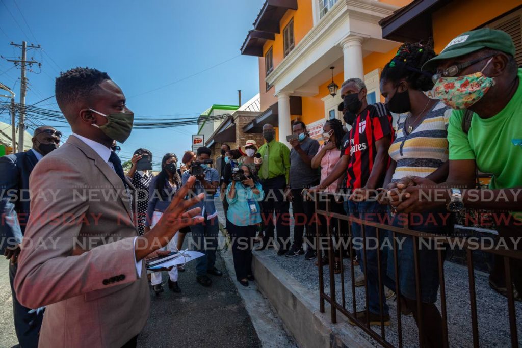 PDP deputy leader Farley Augustine and other PDP assemblymen speak to supporters outside the Assembly legislature Building Scarborough, Tobago after being sworn in last week. - JEFF K MAYERS