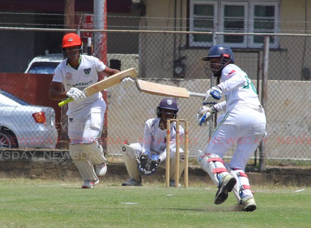 In this March 10, 2020 file photo, St Benedict’s College batsmen, Crystian Thurton (L) and Rodney Kyle Sieunarine, rush for the single,
during the Secondary Schools Cricket League (SSCL) match against Fatima College,at Fatima grounds, Mucurapo Road, St James. - ROGER JACOB
