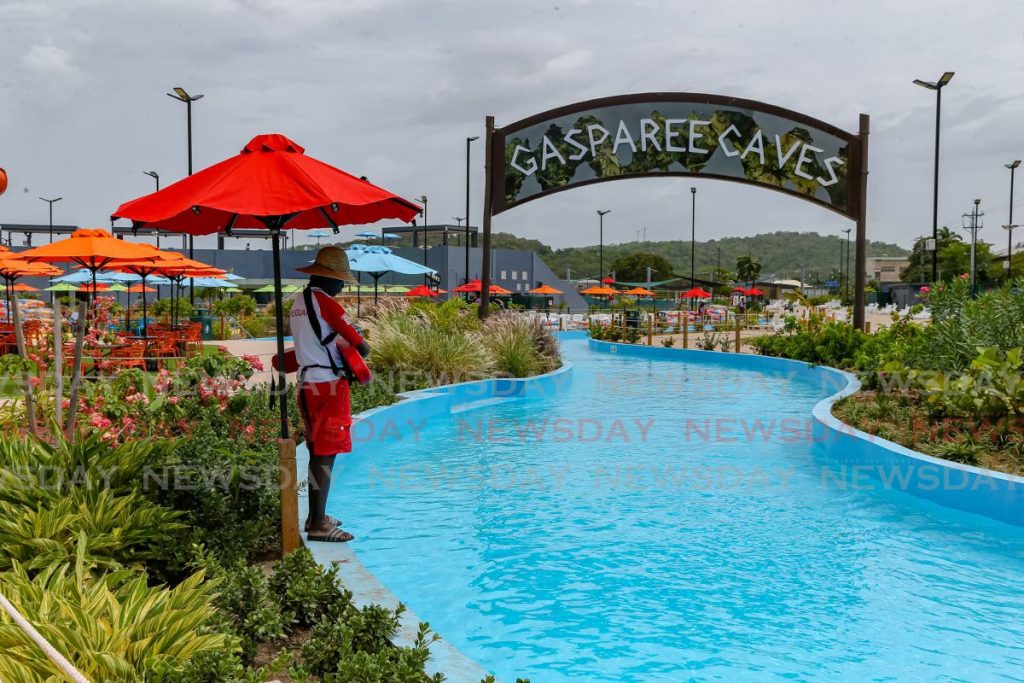 A lifeguard stands watch over an empty pool at Five Islands Water and Amusement Park on June 25, 2020. Water park owners hope Government will lift restrictions on their recreation spaces. PHOTO BY JEFF MAYERS - 