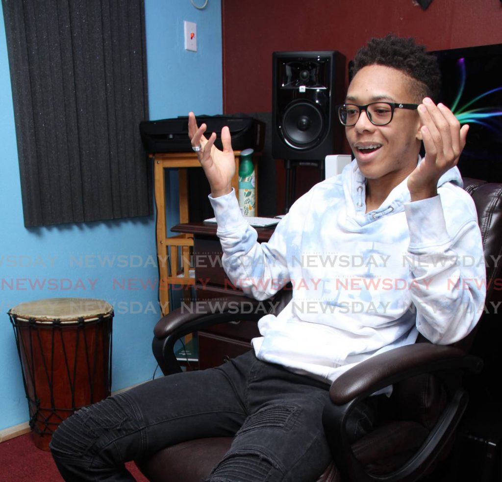 Aaron gesticulates as he chats with Newsday at his recording studio. Duncan is pursuing a bachelor’s degree in music technology at the University of TT. - Angelo Marcelle