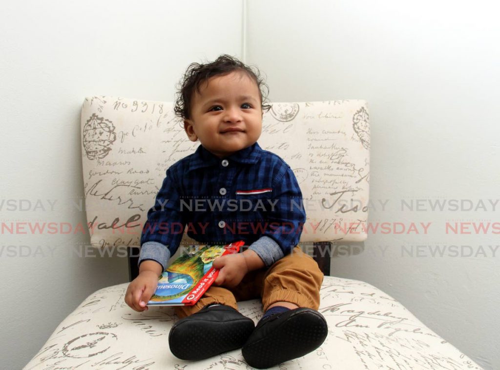 Zeevan Ramnarine, who turns one in May, is the miracle his parents Sursattie and Manuj prayed for. He was conceived using in vitro fertilisation. PHOTOS BY AYANNA KINSALE - 