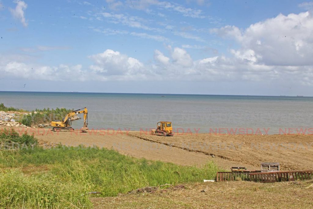 Excavators at a site in La Romaine where the Commissioner of State Lands and EMA officials investigated for illegal backfilling on Friday. - 