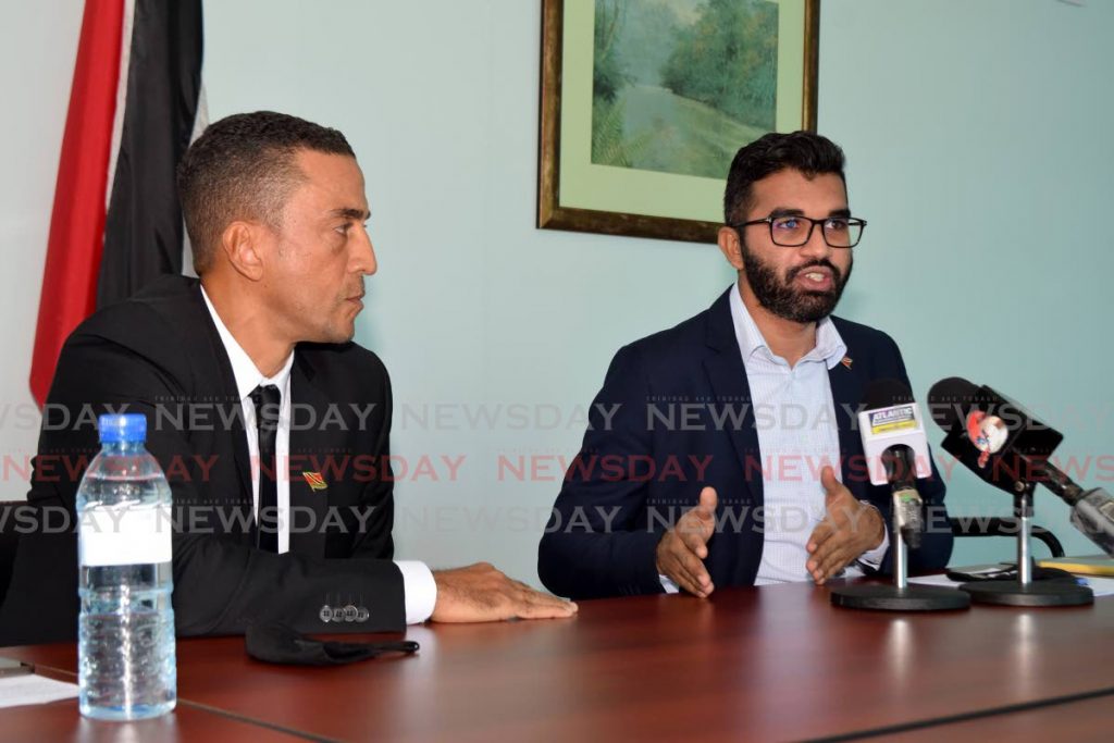 LET’S TALK CRIME: Barataria/San Juan MP Saddam Hosein makes a point on Sunday at a press conference at the Office of the Opposition Leader in Port of Spain. Also in photo is Opposition Senator David Nakhid. PHOTO BY VIDYA THURAB - 
