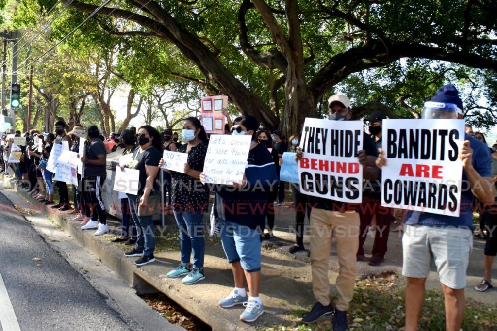 Hundreds of people march around the Queen's Park Savannah, Port of Spain on February 7 calling for legal changes to grant better protection to women and girls following the death of Andrea Bharatt. - Vidya Thurab
